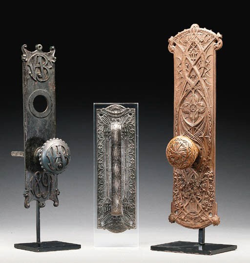 A GROUP OF CAST IRON WINDOW AND DOOR FITTINGS