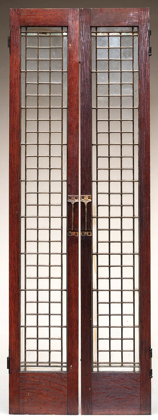 A PAIR OF LEADED GLASS DOORS