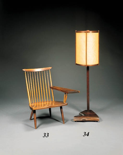 A WALNUT 'LOUNGE' CHAIR