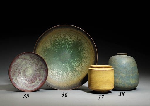 A CERAMIC FOOTED BOWL