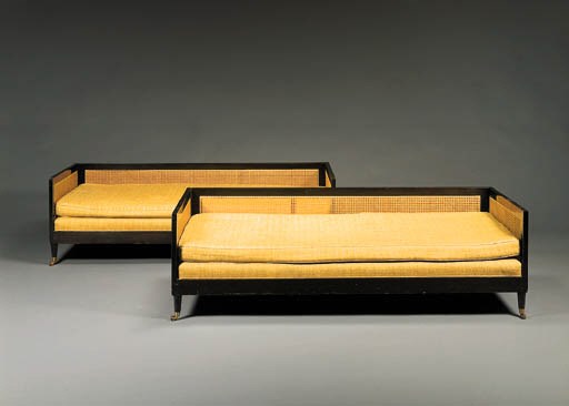 A PAIR OF WALNUT SOFAS