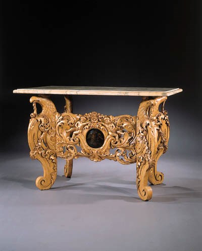 A Dutch giltwood and yellow-painted side table