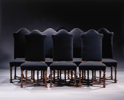 A set of eight walnut chairs