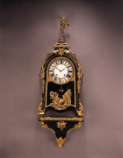 A Regence ormolu-mounted and brass-inlaid tortoiseshell boulle marquetry bracket clock