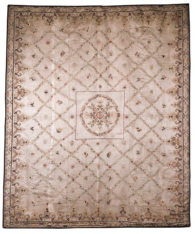 A Chinese silk coverlet