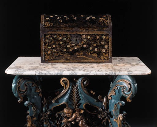 A Japanese lacquer domed coffer