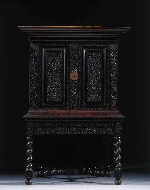 A Dutch colonial ebony cabinet on stand