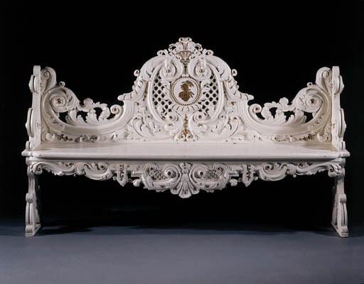 A Dutch parcel-gilt and white-painted hall bench