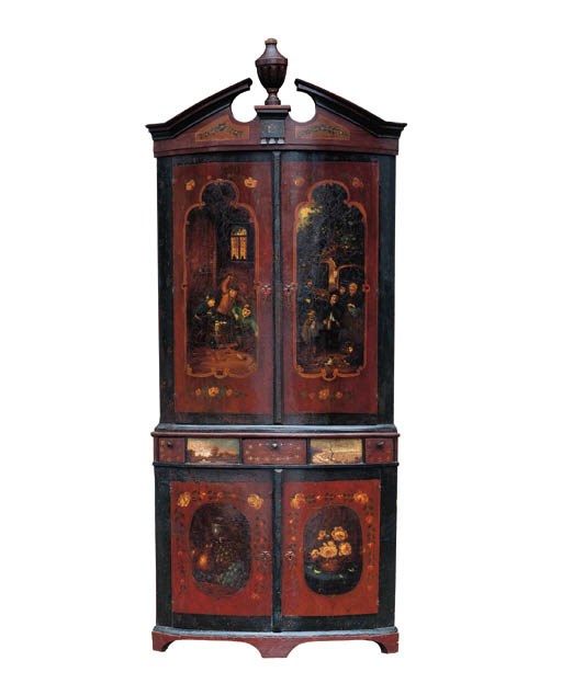 A Dutch polychrome painted corner cupboard