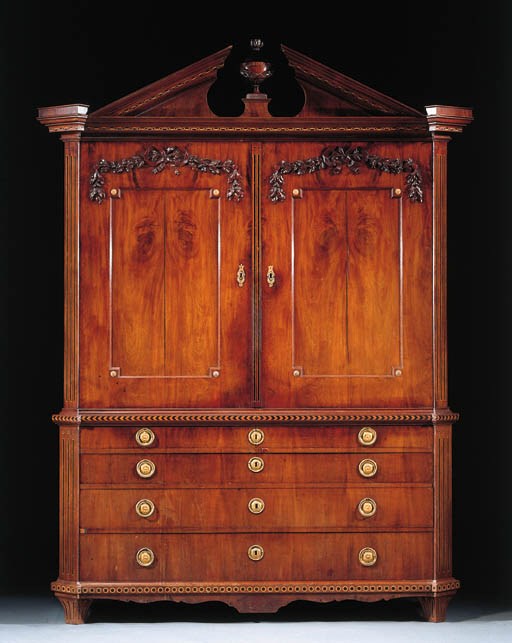 A Dutch ormolu-mounted mahogany, boxwood and ebony cabinet