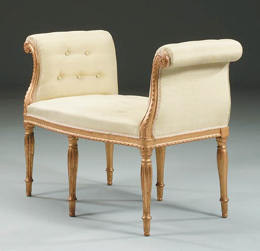 A GEORGE III GILTWOOD WINDOW SEAT