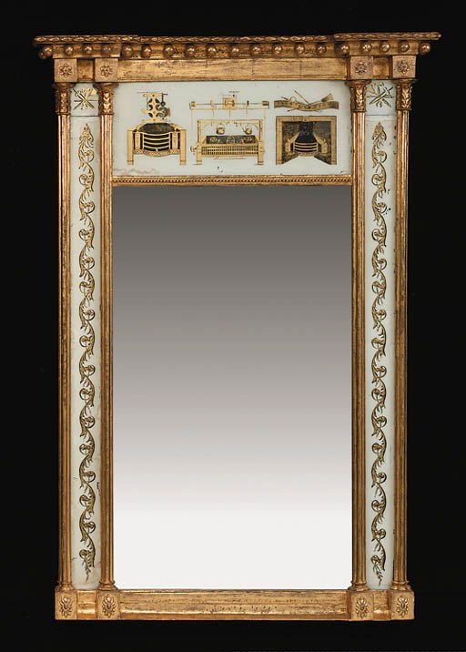 A REGENCY GILTWOOD AND VERRE EGLOMISE MIRROR