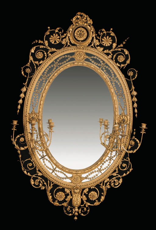 A LATE-VICTORIAN GILTWOOD AND GILT-COMPOSITION SIX-LIGHT OVAL PIER GLASS