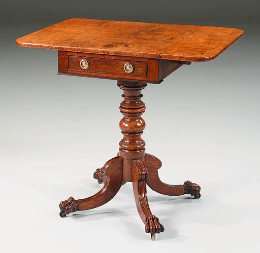 A REGENCY OAK PEDESTAL PEMBROKE TABLE