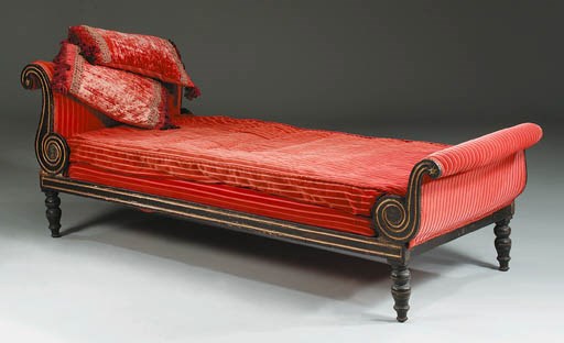 A REGENCY BRASS-MOUNTED EBONISED AND PARCEL-GILT DAYBED