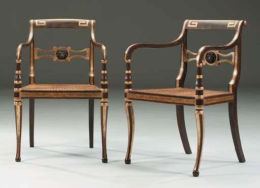 A PAIR OF REGENCY GRAINED AND PARCEL-GILT OPEN ARMCHAIRS