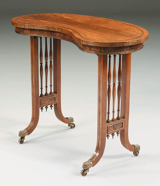 A REGENCY BRASS-INLAID ROSEWOOD KIDNEY-SHAPED WRITING-TABLE