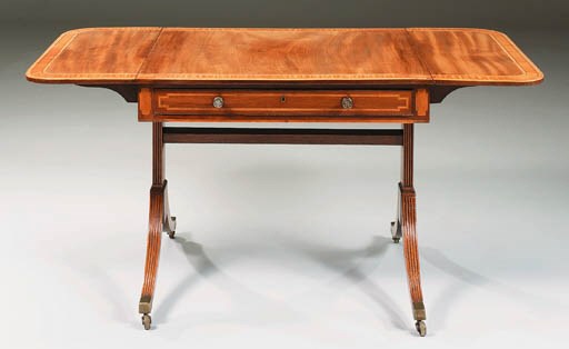 A REGENCY MAHOGANY AND SATINWOOD SOFA TABLE