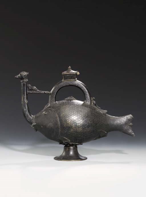 A BRONZE EWER IN THE FORM OF A FISH