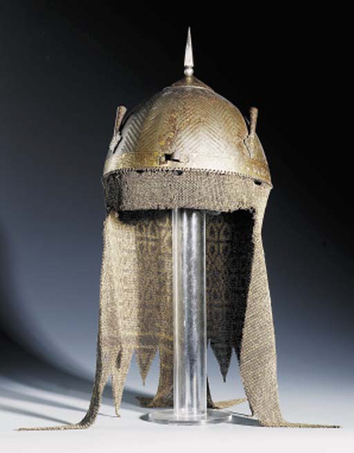 A SAFAVID GOLD DAMASCENED STEEL HELMET