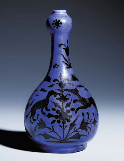 A QAJAR LUSTRE PAINTED COBALT BLUE GLAZED POTTERY BOTTLE