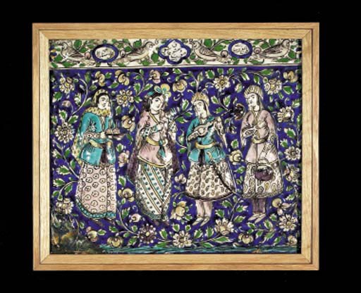 A QAJAR MOULDED POTTERY TILE