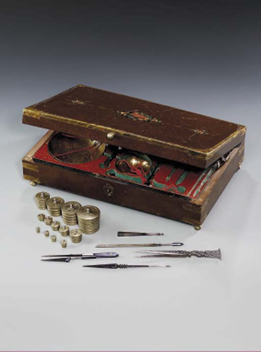 A QAJAR SET OF SCALES IN LACQUER BOX
