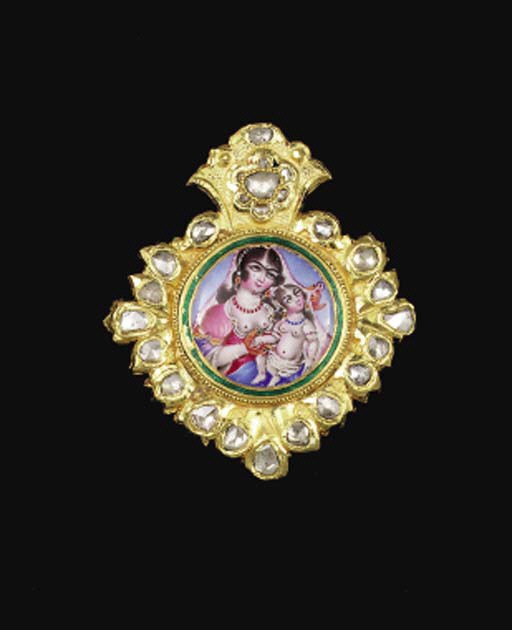 A QAJAR ENAMELLED AND INSET GOLD PENDANT