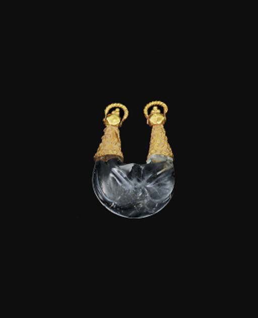 A GOLD SET ROCK CRYSTAL CRESCENT PENDANT TALISMAN