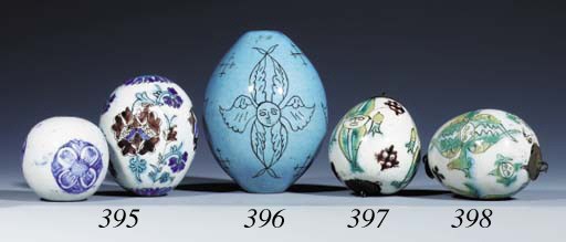 A KUTAHYA TURQUOISE GLAZED POTTERY HANGING ORNAMENT