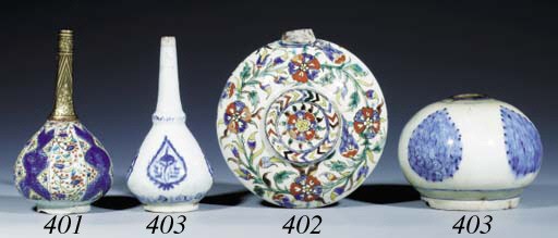 A KUTAHYA BLUE AND WHITE POTTERY ROSEWATER SPRINKLER