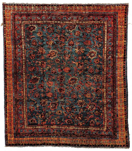 AN ANGORA OUSHAK CARPET