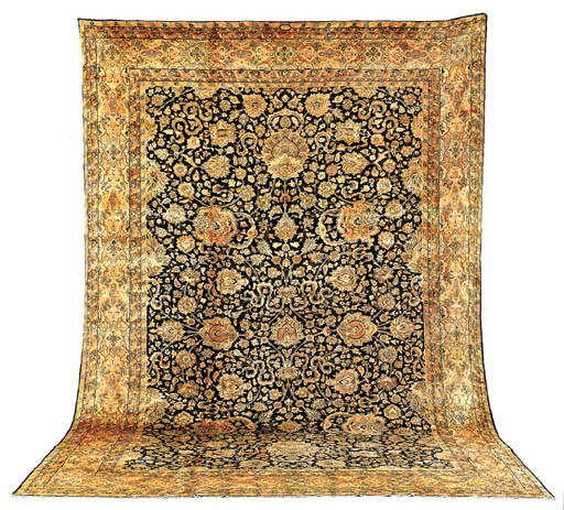A KIRMAN CARPET
