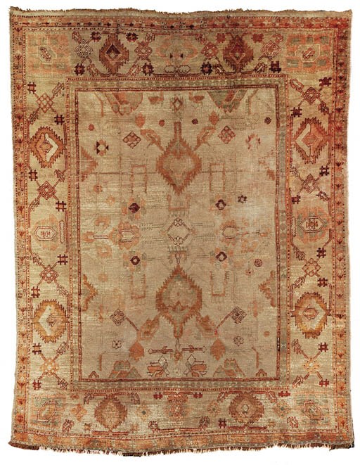 AN ANGORA OUSHAK CARPET