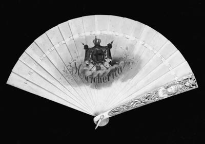 Queen Margherita of Italy, an ivory brise fan painted with the Royal Arms of Italy above the name Margherita, the upper guardstick carved with portrait bust of Queen Margherita with the royal arms above - 9in. (23cm.), circa 1870
