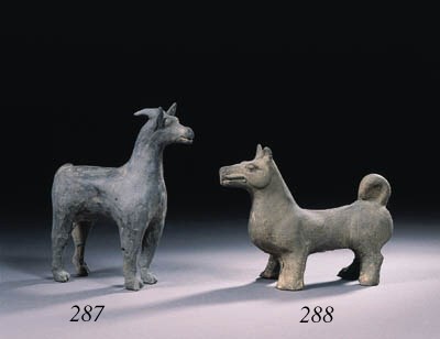 A grey pottery figure of a ram