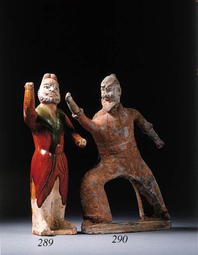 An amber and green glazed figure of a foreign groom