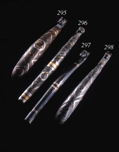 A silver and gold inlaid bronze belt hook, Daigou