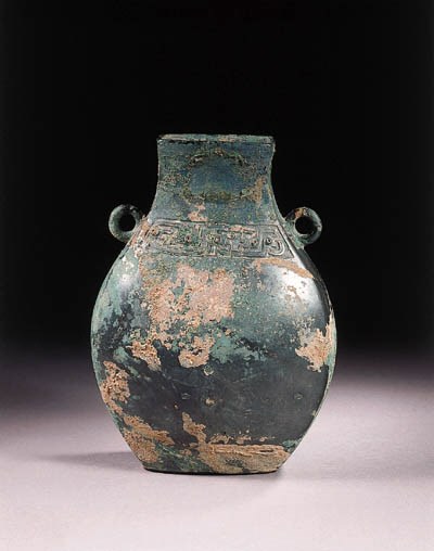 An archaic bronze flattened fang hu