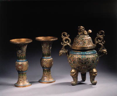 A champleve enamel and gilt-bronze three-piece altar garniture