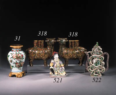 An assorted group of cloisonne works of art