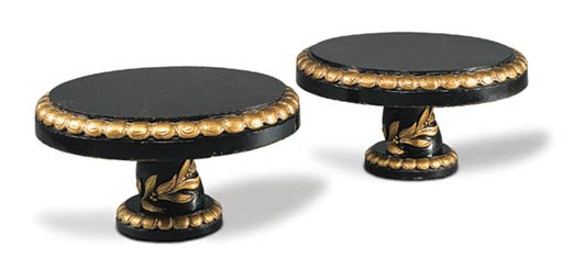 TWO PARCEL-GILT, LAMINATED AND EBONIZED WOOD COCKTAIL TABLES