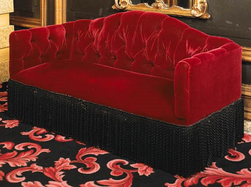 AN UPHOLSTERED SOFA