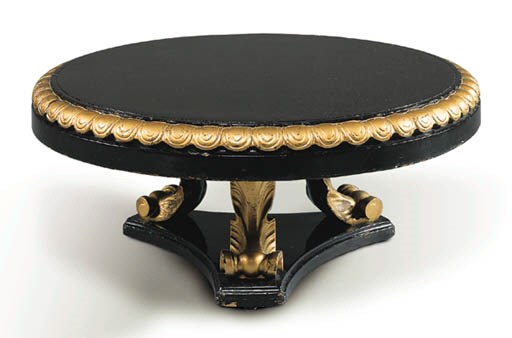 A PARCEL-GILT AND EBONIZED WOOD CIRCULAR COFFEE TABLE