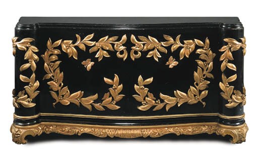 A PAIR OF PARCEL-GILT AND EBONIZED WOOD CONSOLES