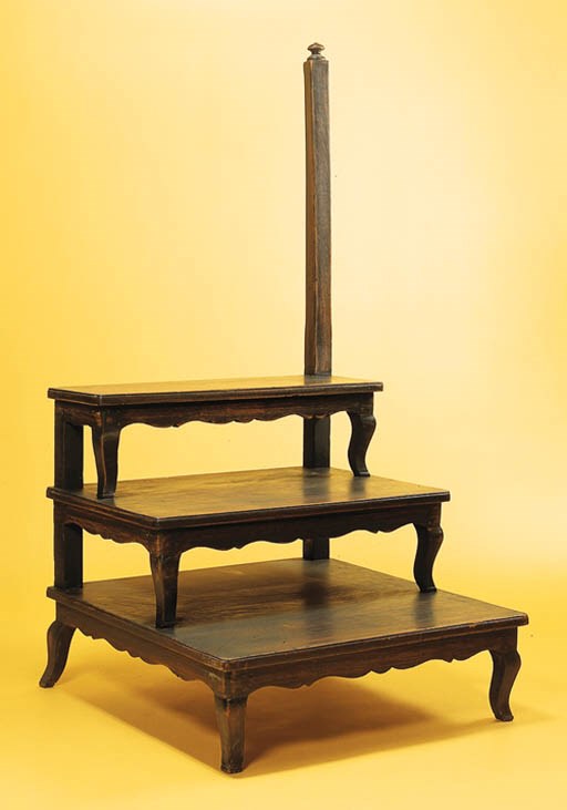 A THREE-TIERED PAINTED SIDE TABLE
