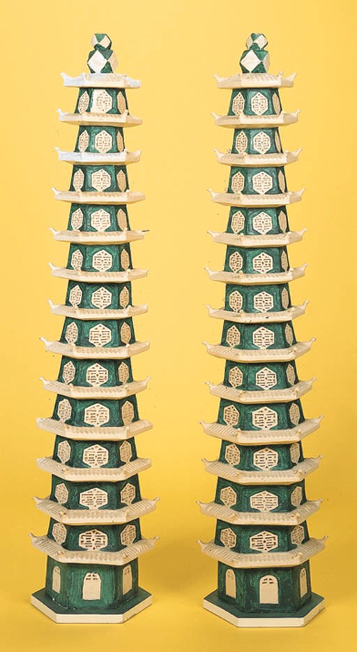 A PAIR OF PAINTED WOOD CAST-RESIN PAGODAS ON WOOD STANDS