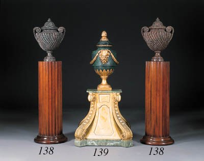A NEOCLASSIC GREEN-PAINTED AND PARCEL-GILT URN ON PEDESTAL