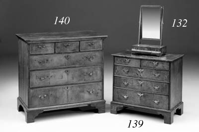 A walnut chest, part 18th century