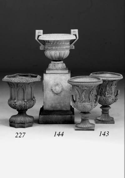 A pair of Douulton stoneware urns